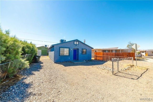 exterior space featuring fence and stucco siding