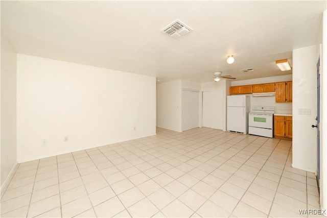 unfurnished living room featuring light tile patterned floors, ceiling fan, and visible vents