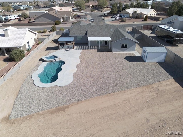 drone / aerial view featuring a residential view