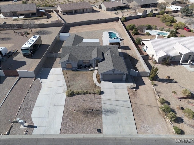 bird's eye view featuring a mountain view and a residential view
