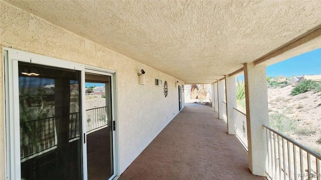 view of patio / terrace featuring a balcony