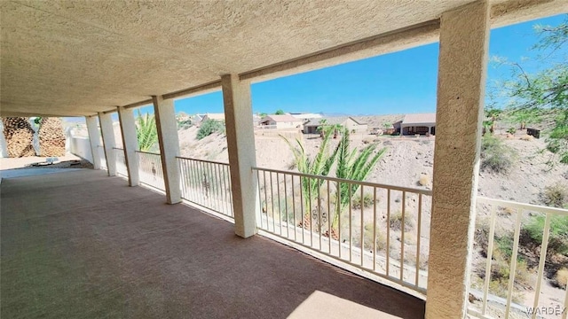 view of patio / terrace with a balcony