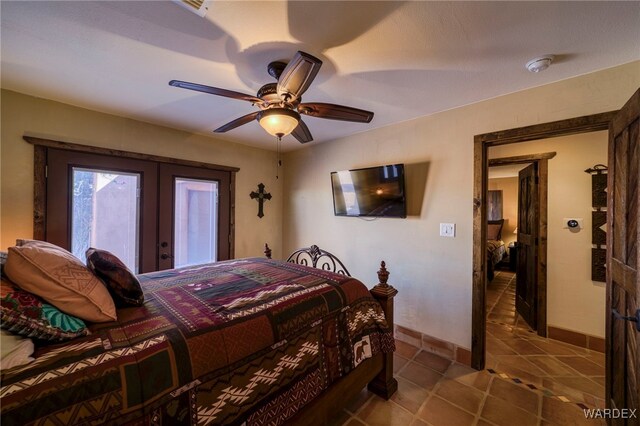 bedroom with french doors, ceiling fan, baseboards, and tile patterned floors