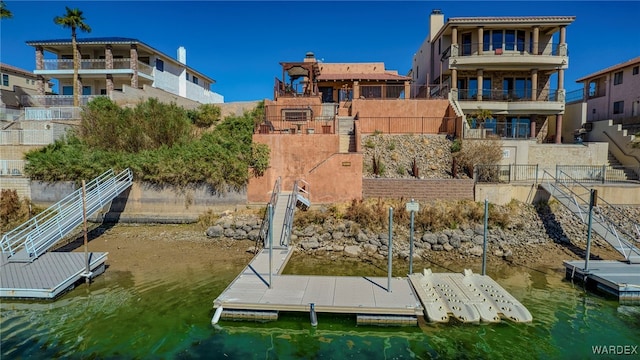 exterior space with a water view