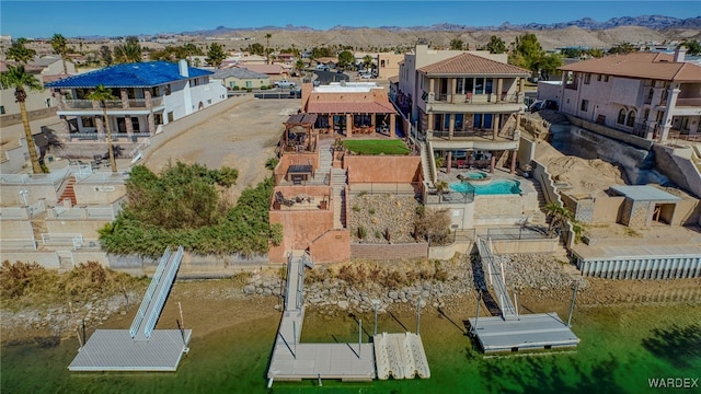 birds eye view of property featuring a residential view and a mountain view