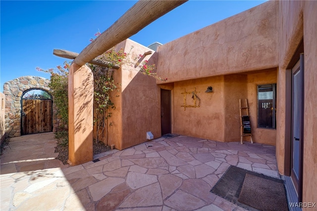 view of patio / terrace featuring fence