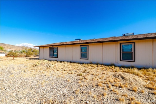 view of home's exterior featuring a mountain view