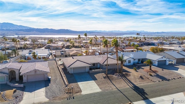 bird's eye view with a mountain view and a residential view