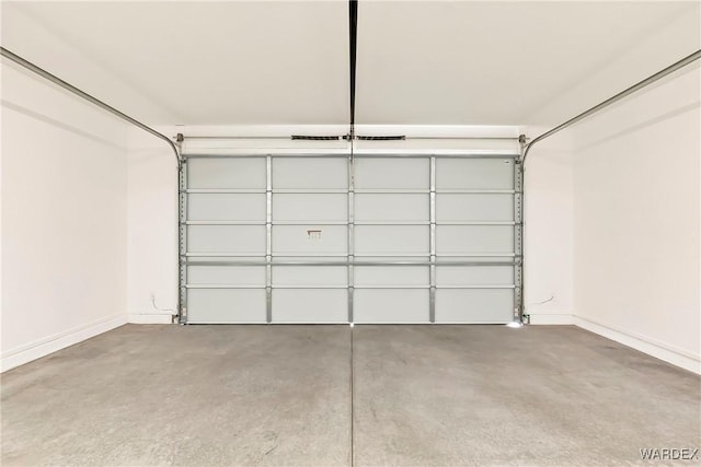 garage with baseboards