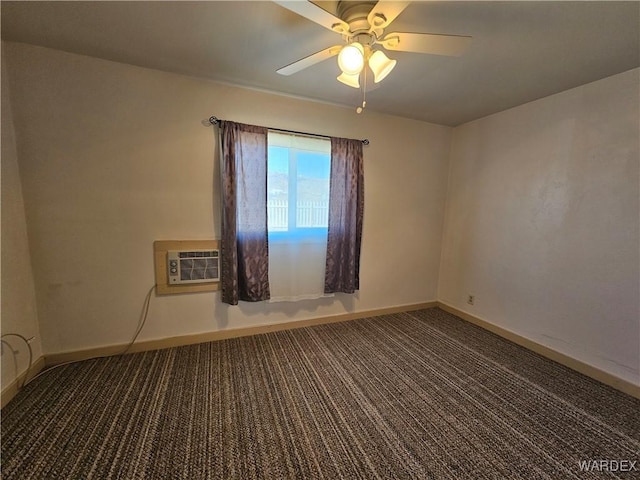 carpeted spare room featuring a ceiling fan, baseboards, and an AC wall unit