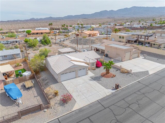 3103 Crater Dr, Lake Havasu, AZ 86404 - aerial perspective of suburban area with a mountainous background