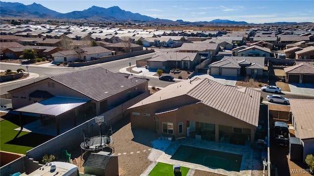 bird's eye view with a residential view and a mountain view