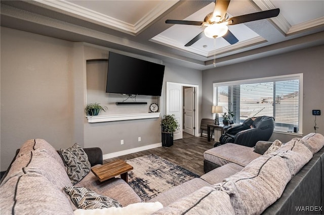 living room featuring baseboards, coffered ceiling, wood finished floors, and crown molding