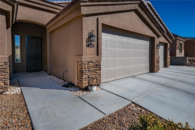 exterior space featuring concrete driveway