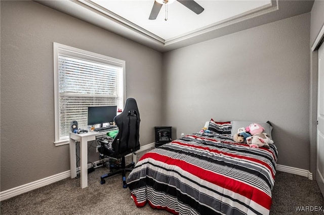 bedroom with carpet, baseboards, and ceiling fan