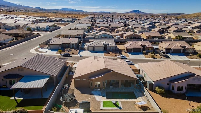 bird's eye view featuring a residential view and a mountain view