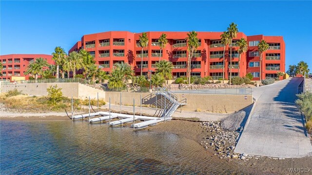 view of building exterior with a water view