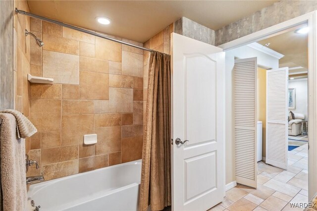 bathroom with recessed lighting and shower / bathtub combination with curtain