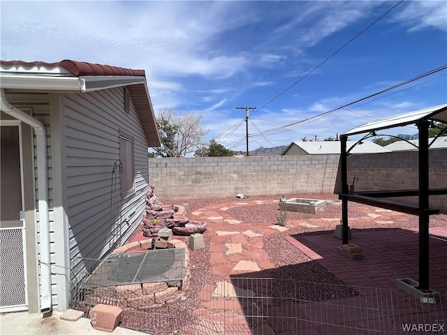 view of patio featuring a fenced backyard