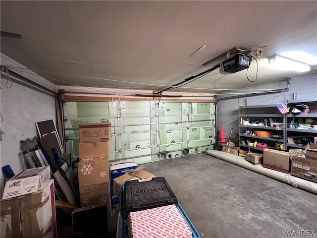 garage featuring a garage door opener