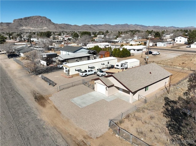 birds eye view of property with a residential view and a mountain view