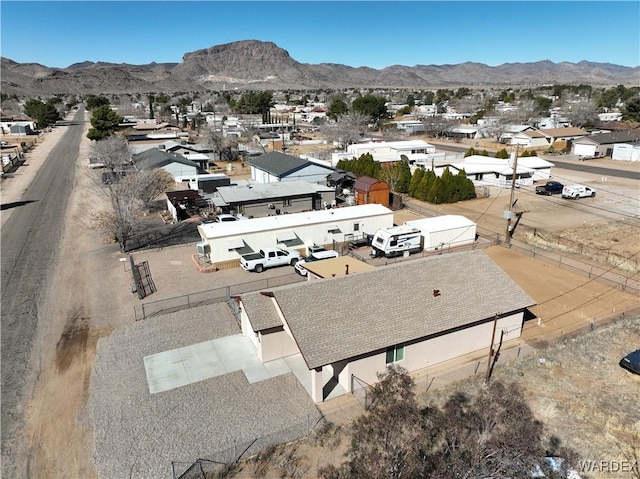 birds eye view of property with a residential view and a mountain view