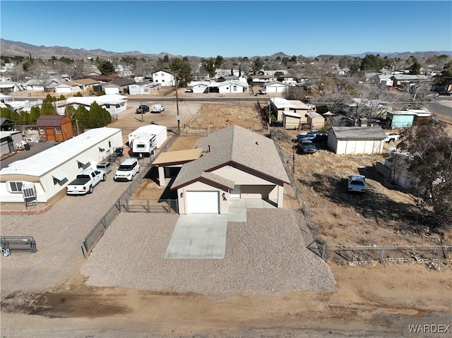 drone / aerial view with a mountain view and a residential view