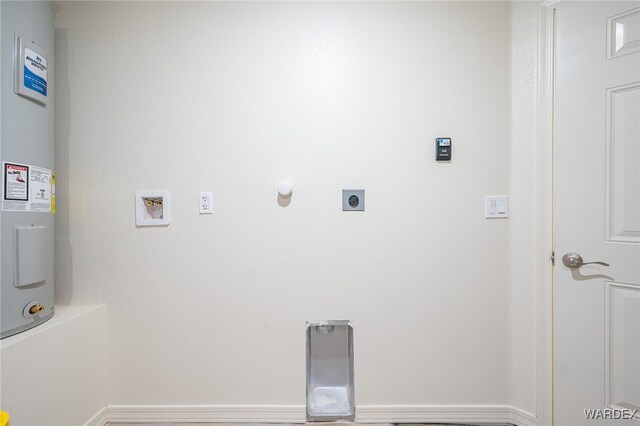 laundry area featuring electric water heater, laundry area, hookup for a washing machine, and electric dryer hookup