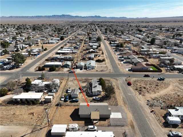 birds eye view of property featuring a residential view and a mountain view