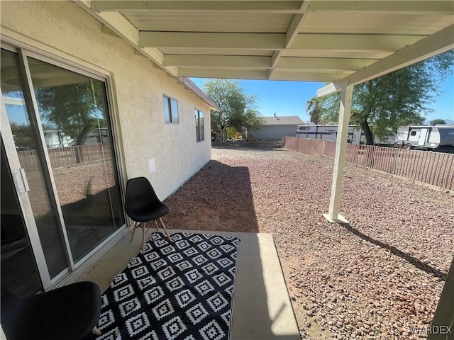 view of yard with a patio area and a fenced backyard