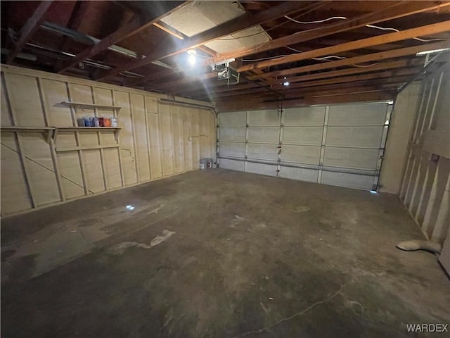 1720 E Valencia Rd, Fort Mohave, AZ 86426 - garage featuring a garage door opener