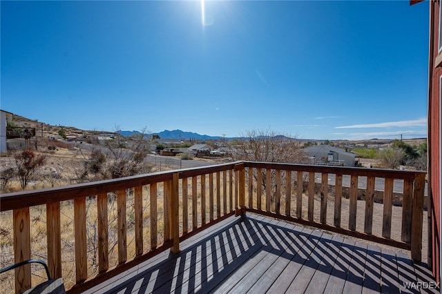 wooden terrace with a mountain view