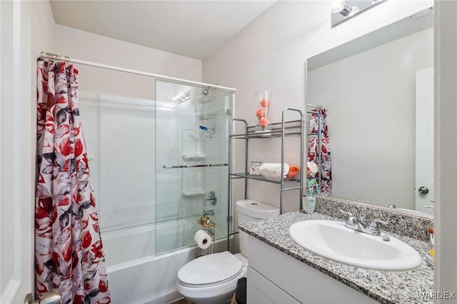 bathroom with toilet, shower / tub combo, and vanity