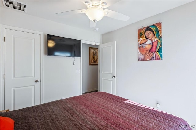 unfurnished bedroom featuring visible vents and ceiling fan