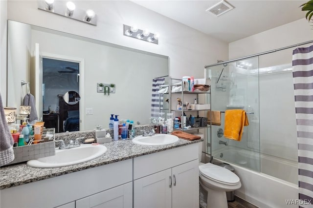 bathroom with shower / tub combo with curtain, visible vents, a sink, and double vanity