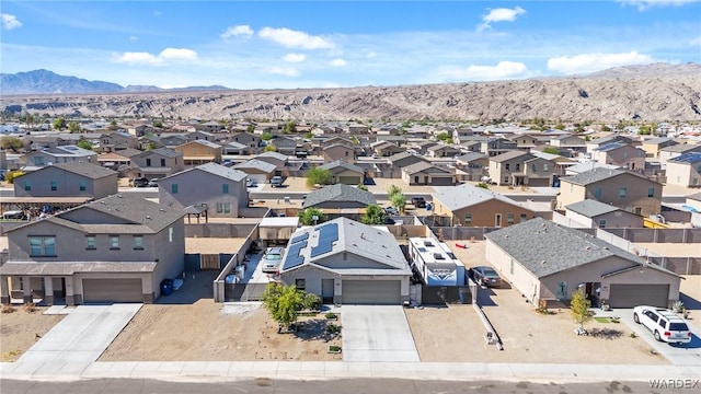 bird's eye view featuring a residential view and a mountain view