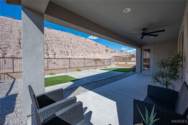 view of patio / terrace featuring ceiling fan and a fenced backyard