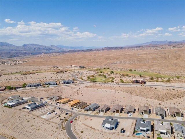 birds eye view of property with a residential view and a mountain view