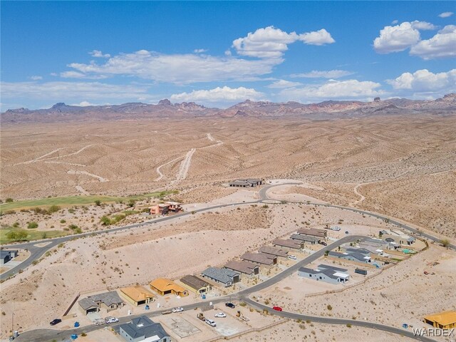 birds eye view of property featuring a mountain view