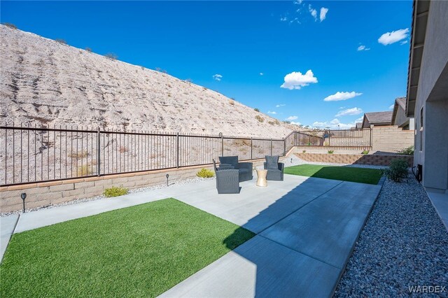 view of yard featuring a fenced backyard and a patio