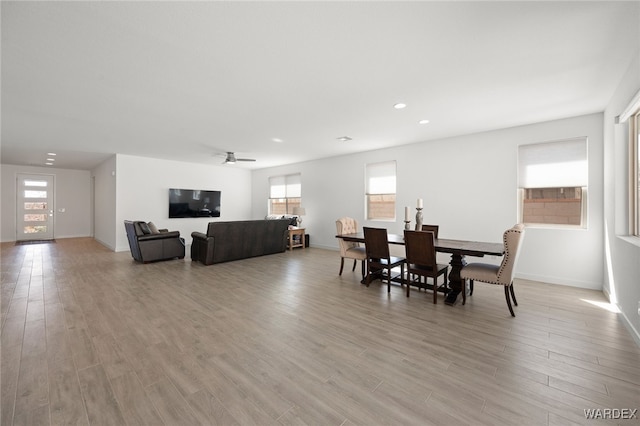 dining space featuring light wood-style floors, recessed lighting, baseboards, and a ceiling fan