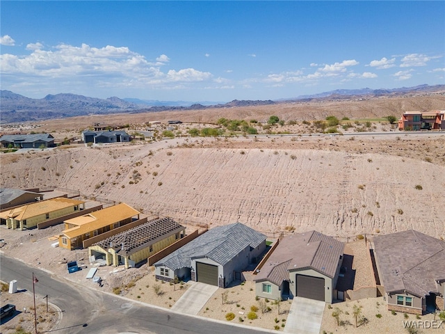 bird's eye view with a residential view and a mountain view