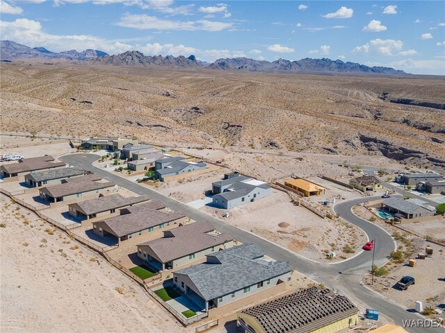 bird's eye view with a residential view and a mountain view