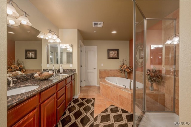 231 Moser Ave Unit G, Bullhead City, AZ 86429 - bathroom with a sink, tile patterned flooring, a shower stall, and visible vents