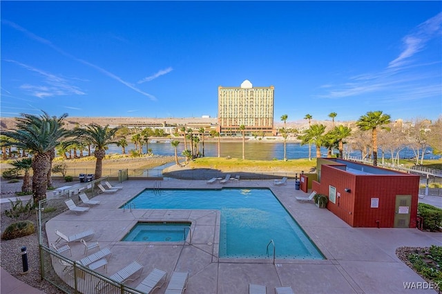 231 Moser Ave Unit G, Bullhead City, AZ 86429 - community pool featuring a hot tub, a water view, and a patio area