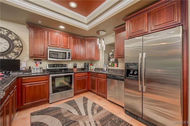 231 Moser Ave Unit G, Bullhead City, AZ 86429 - kitchen with crown molding, light tile patterned flooring, appliances with stainless steel finishes, dark stone counters, and recessed lighting