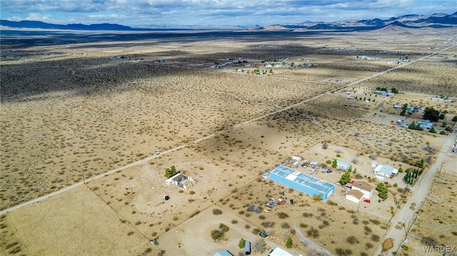 bird's eye view featuring a desert view and a mountain view