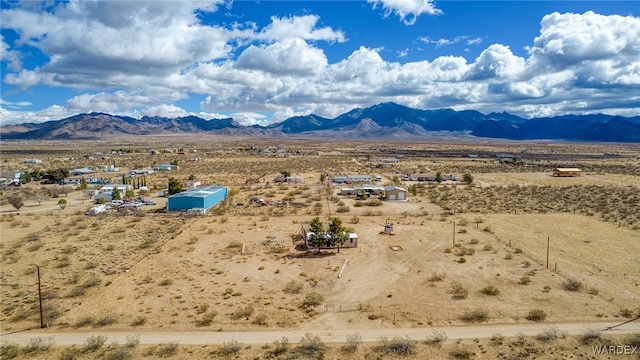 mountain view featuring a desert view and a rural view