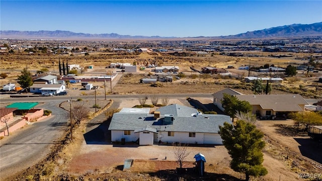 birds eye view of property with a residential view and a mountain view