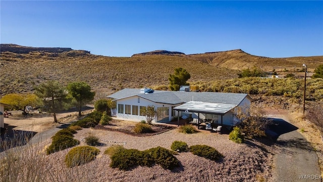 exterior space featuring a mountain view